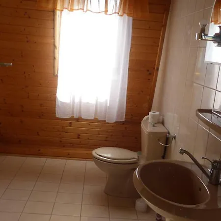 Aranynap House *